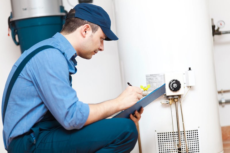 Hempstead Plumber installing a new water heater on Long Island